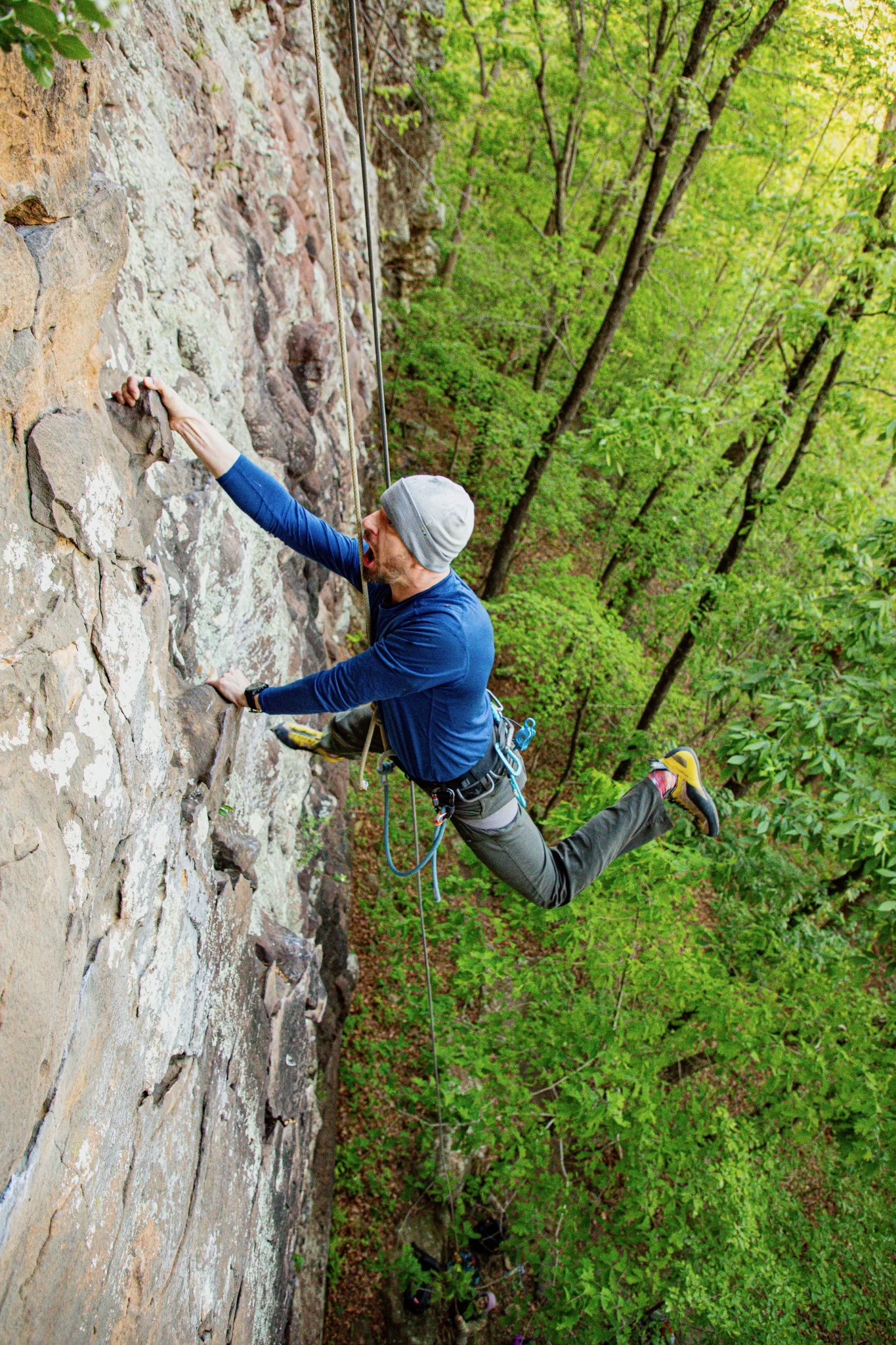 Climbing an overhung sandstone route